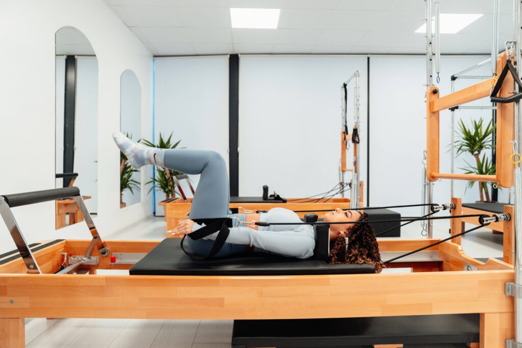 woman-doing-pilates-on-machine